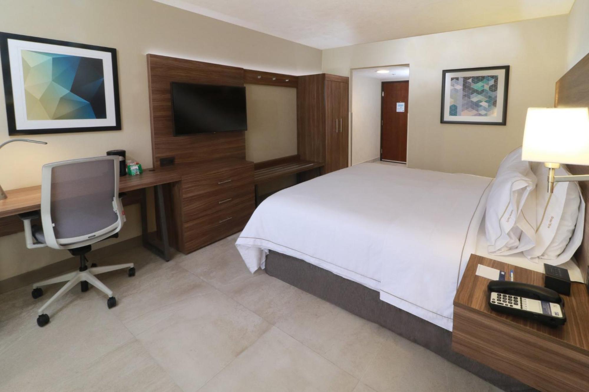 Holiday Inn Express Guadalajara Aeropuerto By Ihg Las Pintas Extérieur photo